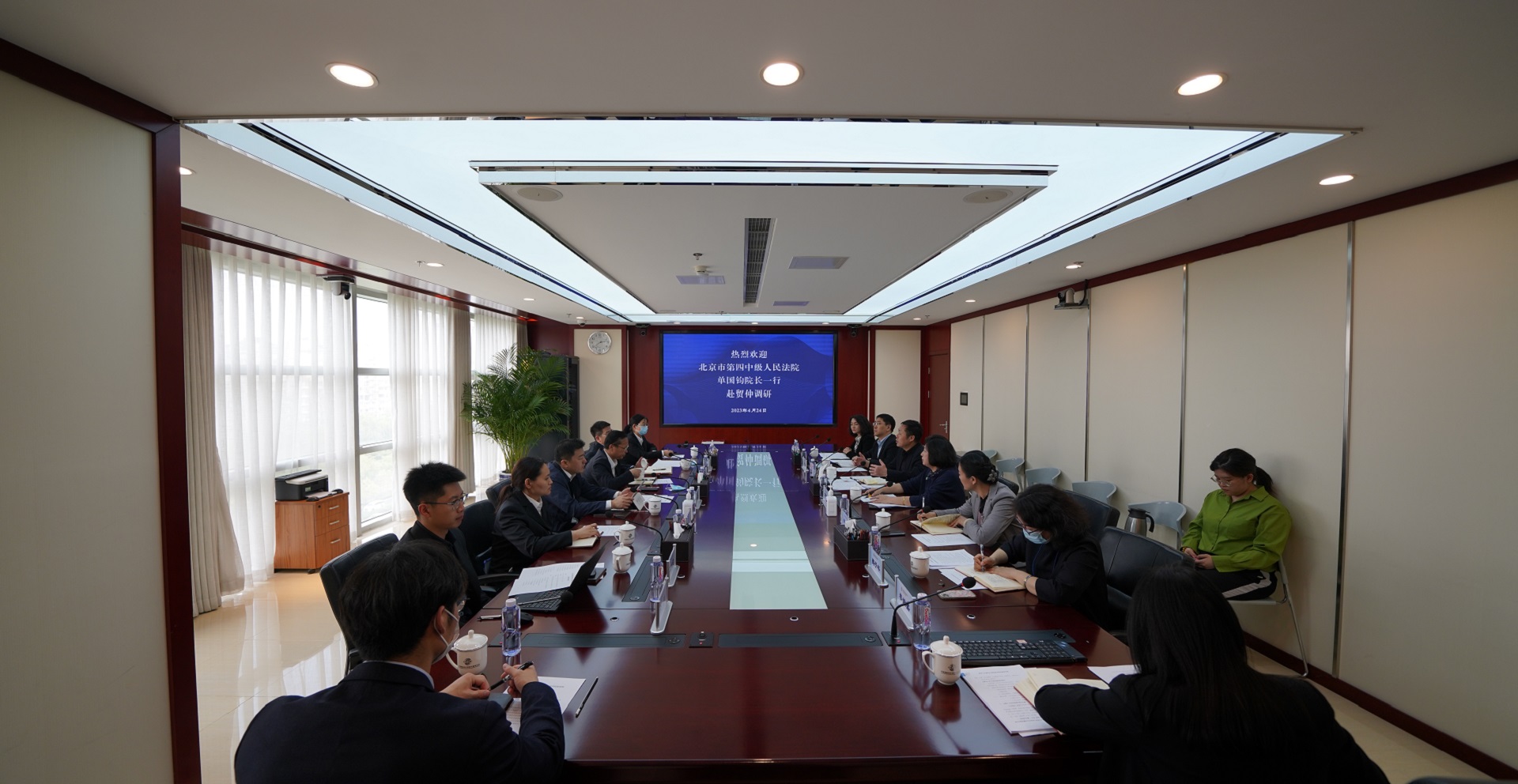 Beijing Fourth Intermediate People’s Court holds symposium with CIETAC