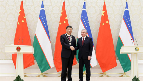 Xi receives Order of Friendship conferred by Uzbek President Mirziyoyev