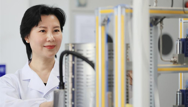 Diligent female chemist steeps in scientific innovation