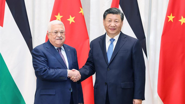 Xi meets with Palestinian President Mahmoud Abbas