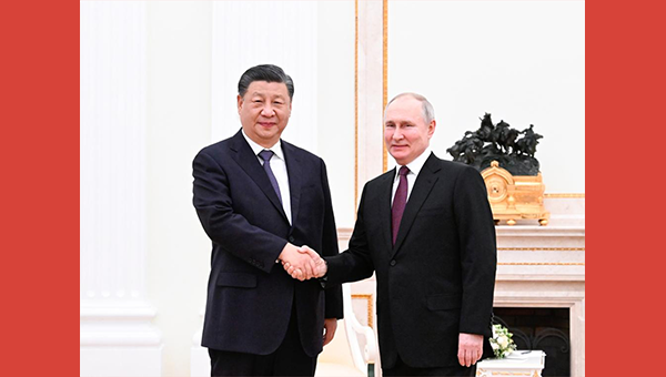 Xi meets Putin in Moscow