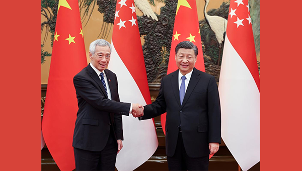 Xi meets Singaporean PM