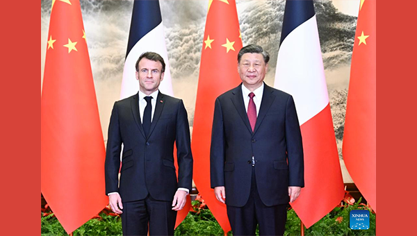 Xi holds talks with French president