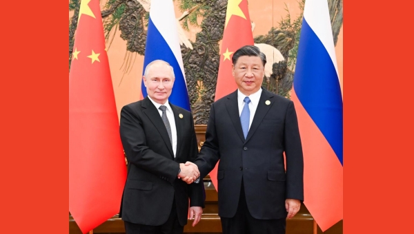 Xi, Putin hold talks in Beijing