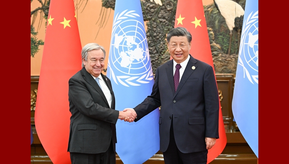 Xi meets Guterres, pledging to work with UN for world peace, development