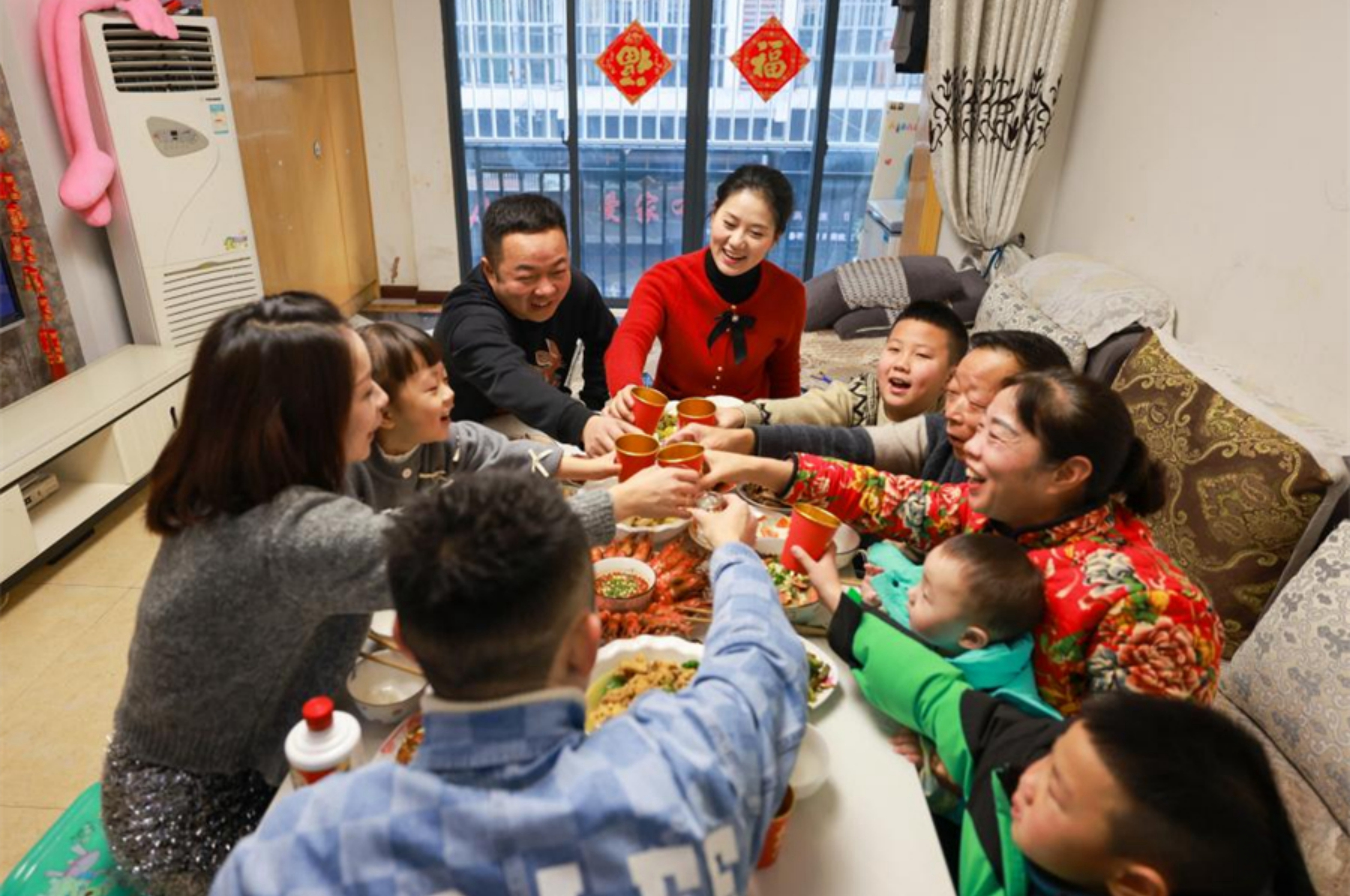 People across China have family reunion dinners on Chinese Lunar New Year's eve