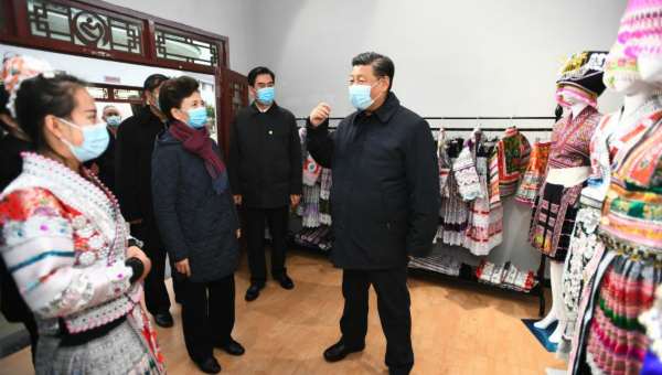 Xi gives Miao embroidery thumbs up while visiting SW China village