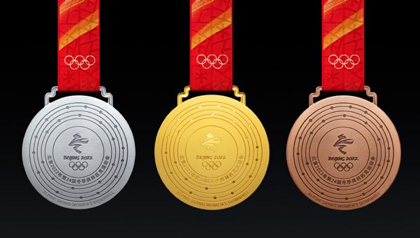 Winter Olympic medals make highly anticipated debut