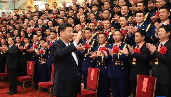 Xi meets with national role models in emergency management, loyal guards in fire-fighting