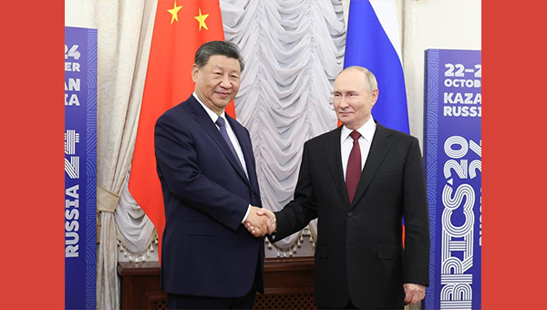 Xi says China, Russia find right way for neighboring major countries to get along with each other