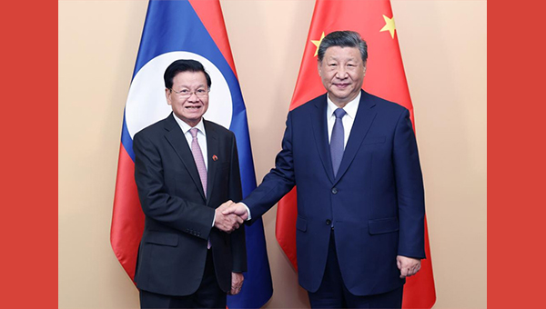 Xi urges China, Laos to forge model for BRI cooperation