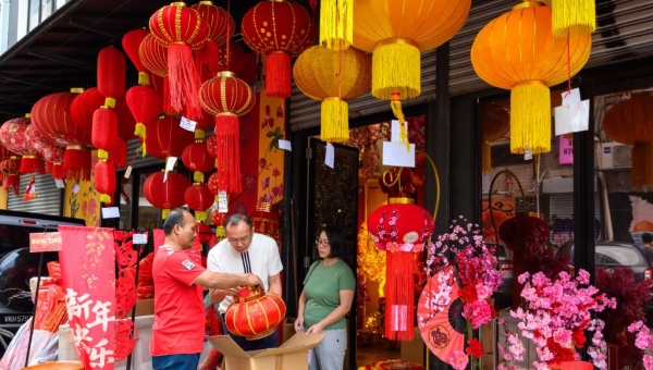 People buy decorations for upcoming Spring Festival in Malaysia