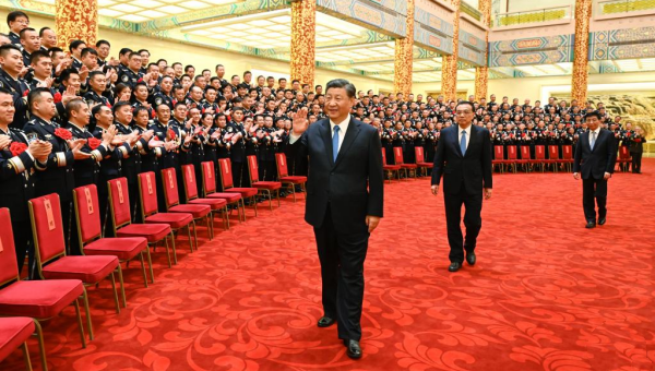 Xi meets heroes, role models from public security system