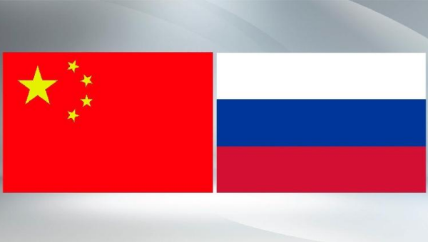 Xi, Putin exchange New Year greetings