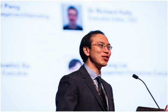 Shen Hong, head of pharmaceutical chemistry at the Shanghai Roche R&D Center delivers opening remarks.png