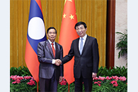 Wang Huning meets with leader of Lao Front for National Construction
