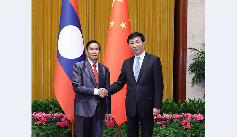 Wang Huning meets with leader of Lao Front for National Construction