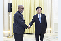 Wang Huning meets Rwandan Patriotic Front delegation