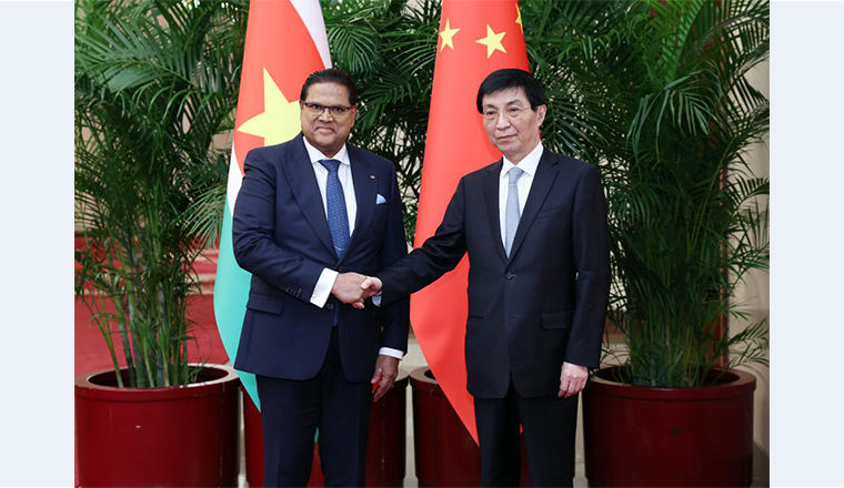 Wang Huning meets Surinamese president