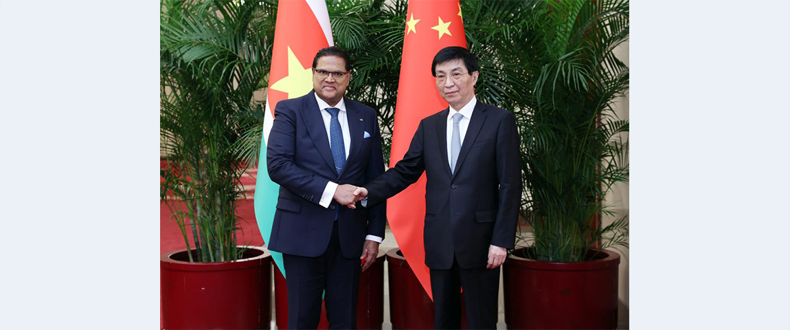 Wang Huning meets Surinamese president