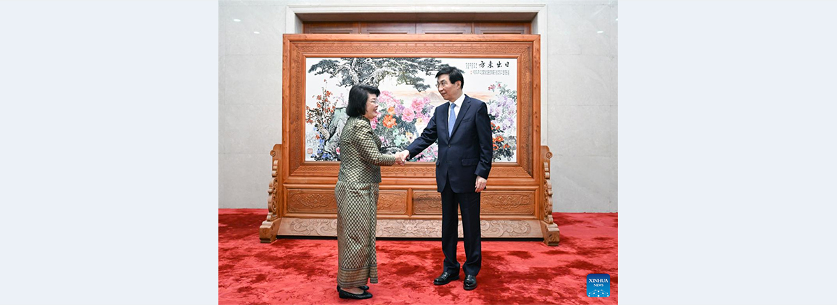 Wang Huning meets Cambodia's National Assembly president