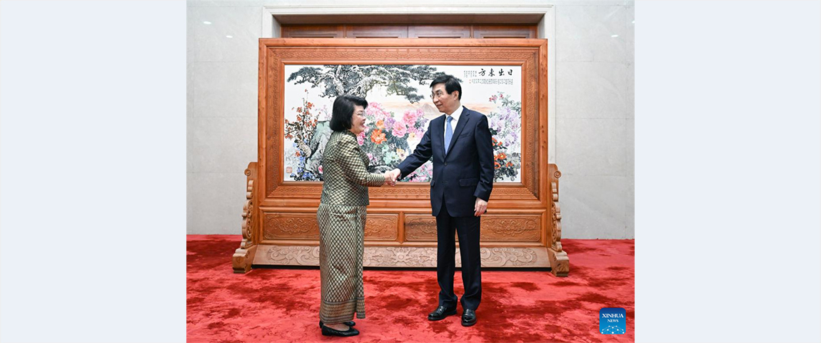 Wang Huning meets Cambodia's National Assembly president