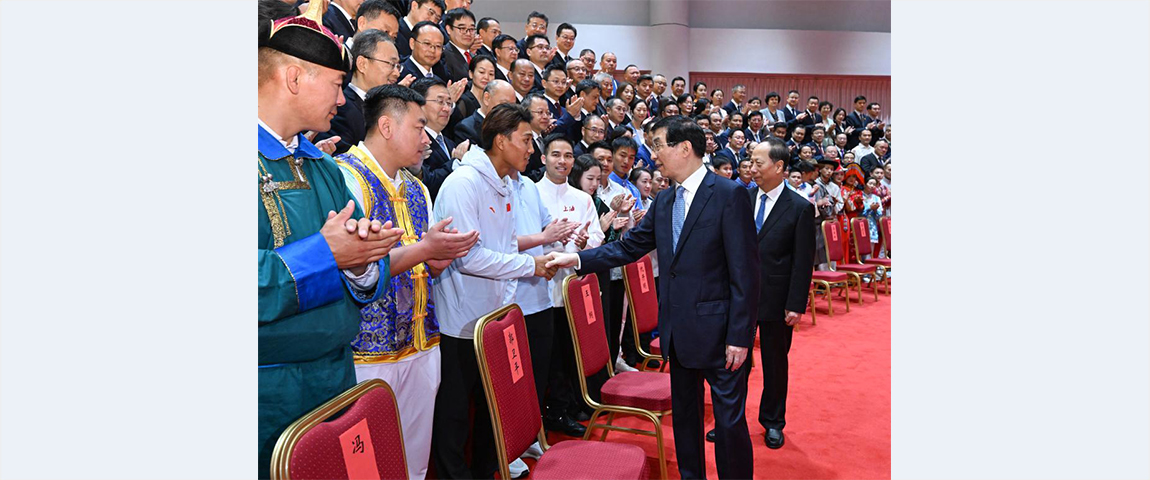 Wang Huning attends opening ceremony of National Traditional Games of Ethnic Minorities