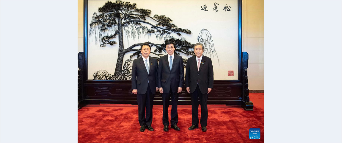 Wang Huning meets Japan's ruling coalition delegation