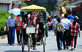 Across China: China targets tourist misbehavior