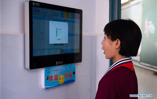 New school year in China begins with strict COVID-19 measures