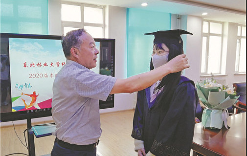 One year late, but student graduates with flying colors