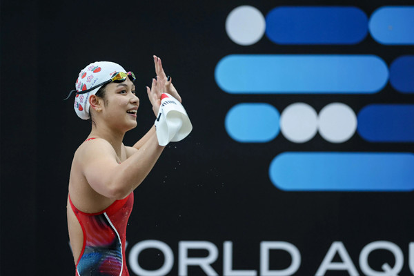 Quzhou's Yu breaks Asian record at Swimming World Cup