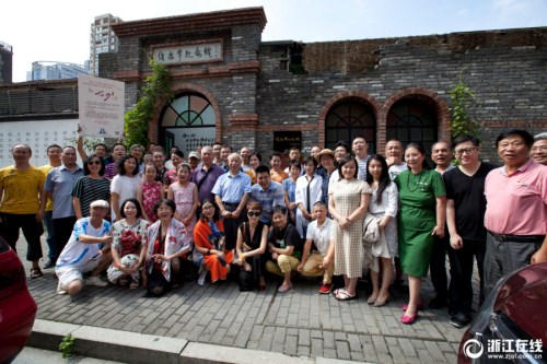 Participants of a poet reciting activity pose in front of the Xu Zhimo Memorial Museum in Hangzhou, Zhejiang province, on Aug 14..jpg