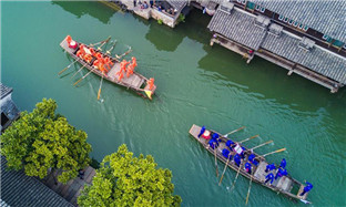 Boat competition held to celebrate Sanyuesan Festival in Zhejiang
