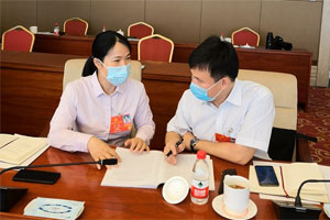 NPC deputy Zhou: Tech, innovation key to upgrading traditional companies
