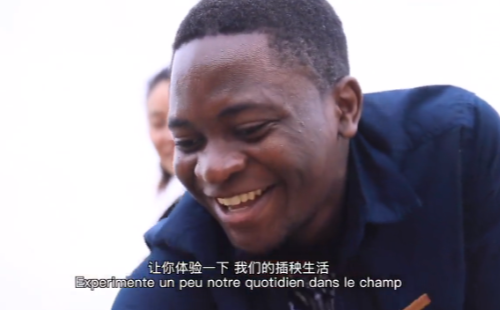 African young man discovers modern countryside in Zhejiang