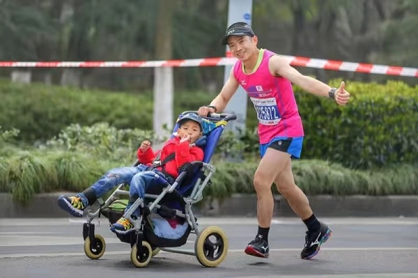 Father pushes ill son through marathons