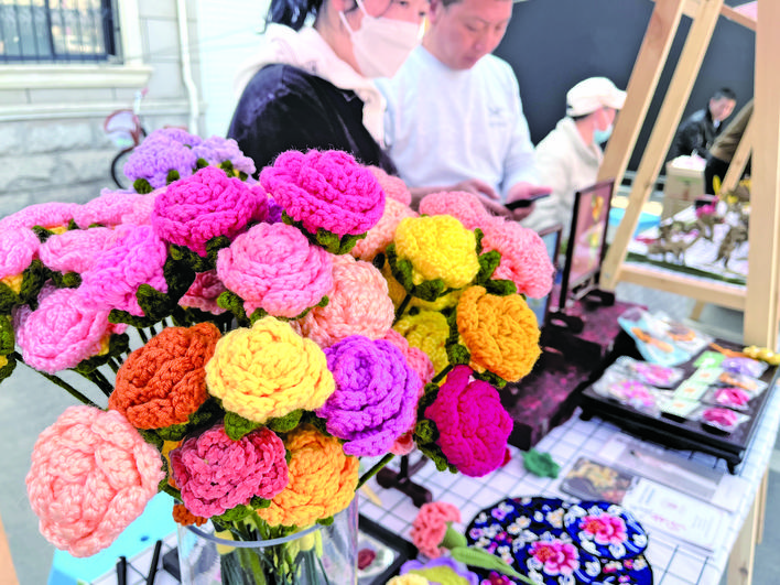 Jinhua holds camellia-themed ICH fair