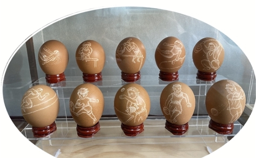 Folk artist breathes life into Asian Games athletes on eggshells