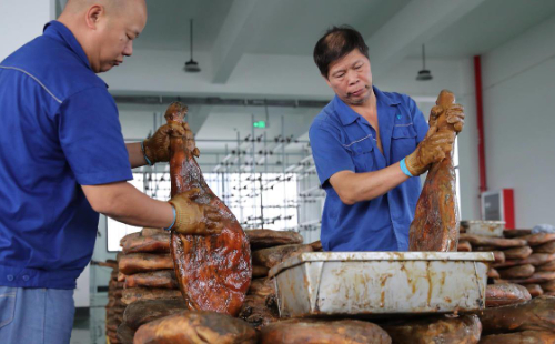 Local ham brand launches production in Shaoxing