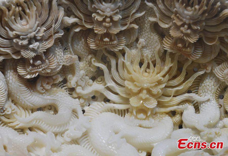 Exquisite dragon-themed shell carving artworks
