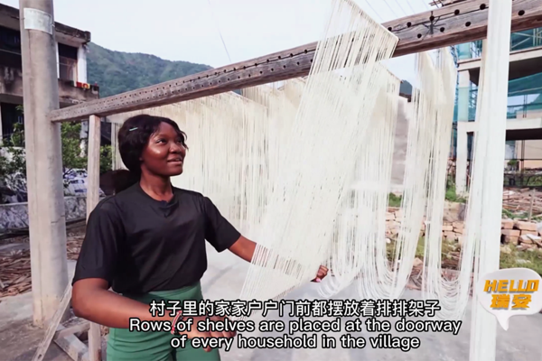 Nigerian woman explores 'longevity noodles' in Nanshan