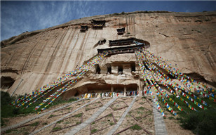 Restoration of ancient grottoes begins in China's Gansu