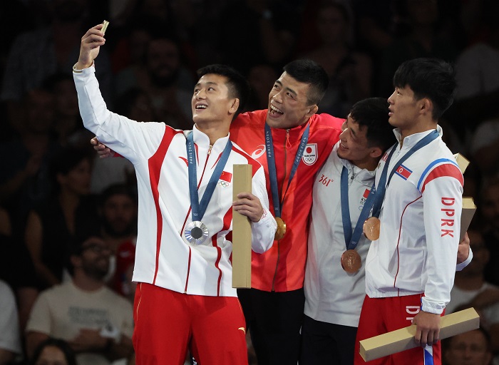 Cao Liguo wins Guangxi's 1st Olympic wrestling medal