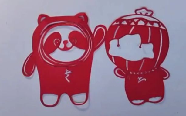 Mulam paper-cutting inheritor creates Winter Olympics mascot