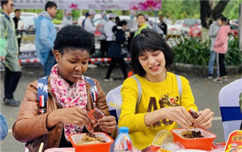 Guangxi marks Sanyuesan Festival with folk choirs, snail noodles