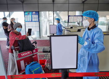 China shortens centralized quarantine periods, adjusts other guidelines