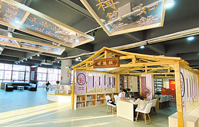 Dragon boat-featured library opens in Xiasha community
