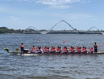 Tianhe dragon boat team triumphs in intl race