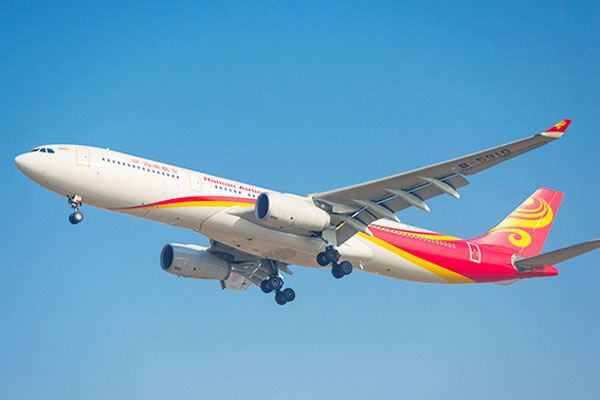 An Airbus A330 jet plane of Hainan Airlines of HNA Group takes off from the Shenzhen Baoan International Airport in Shenzhen city, South China's Guangdong province, December 30, 2014. PhotoIC.jpeg